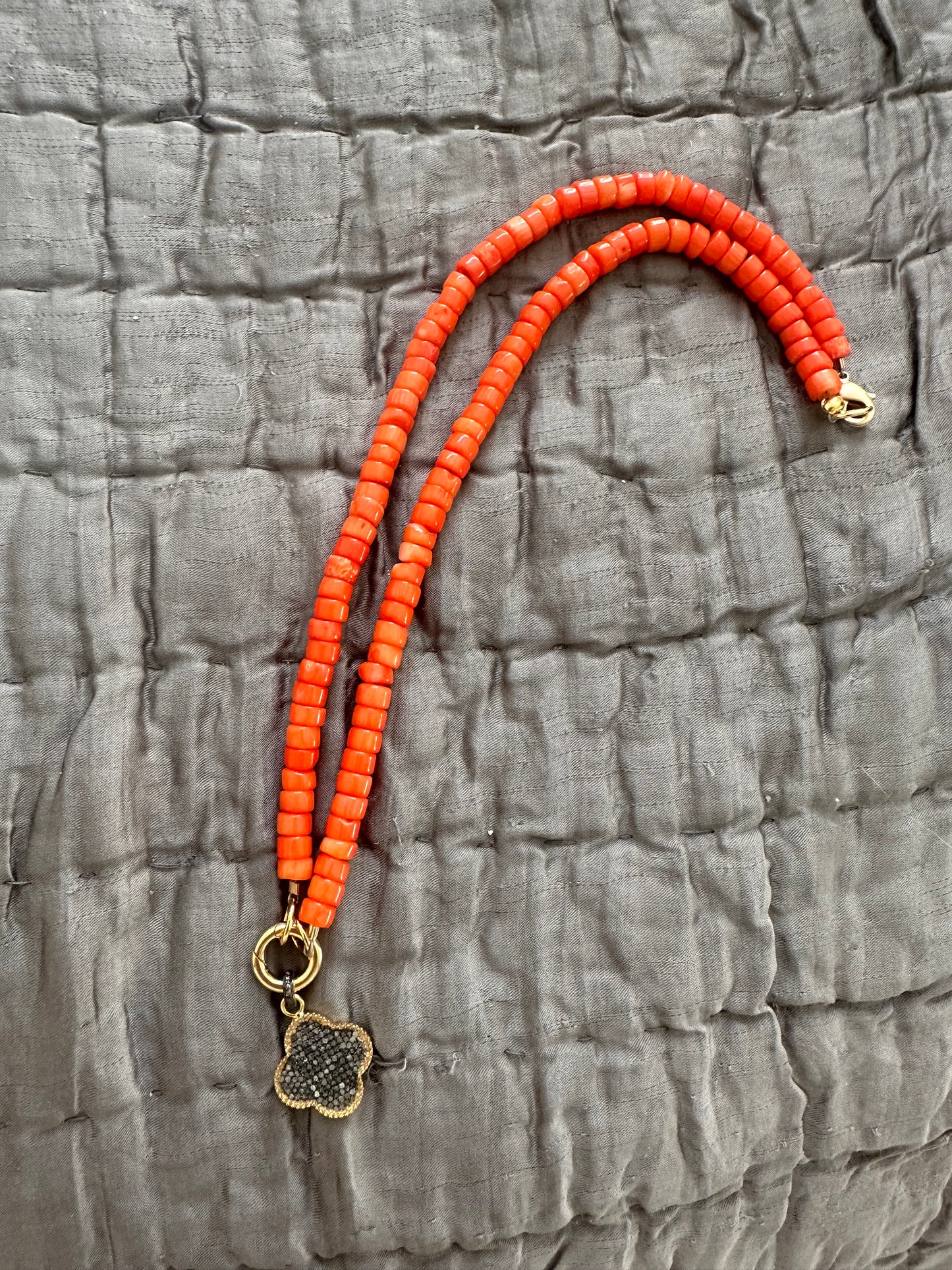 Pavé fleur de lis on orange wooden beads