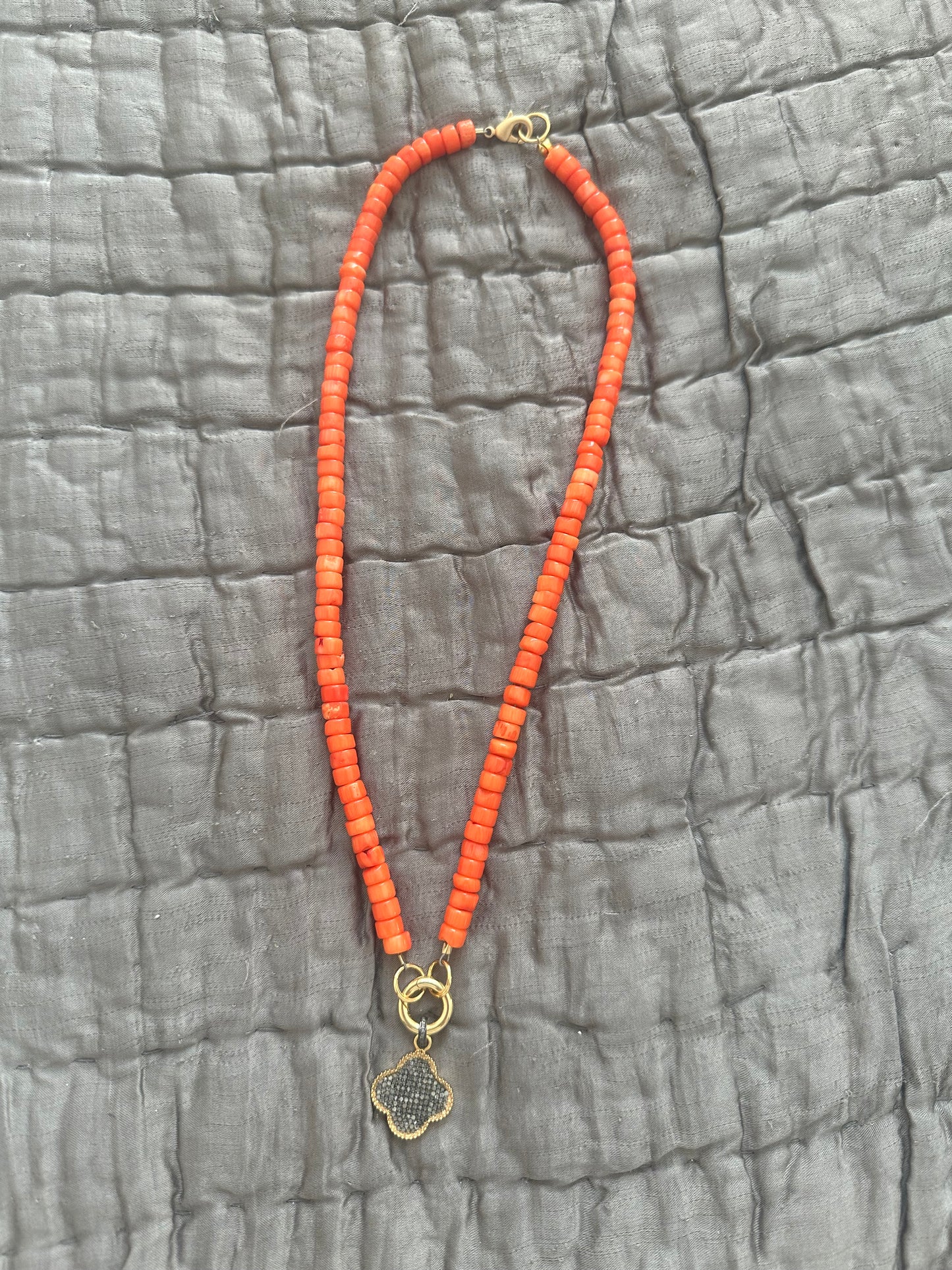 Pavé fleur de lis on orange wooden beads